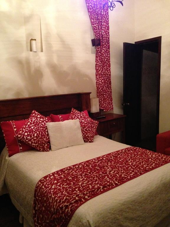 Roka Plaza Hotel Boutique Ambato Habitación foto